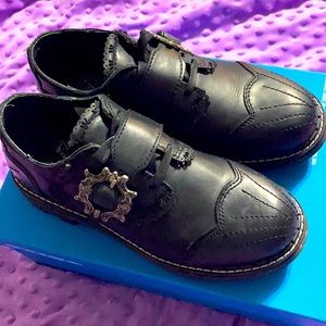 Capellan Fluevogs. Black shoes. Fancy buckles
